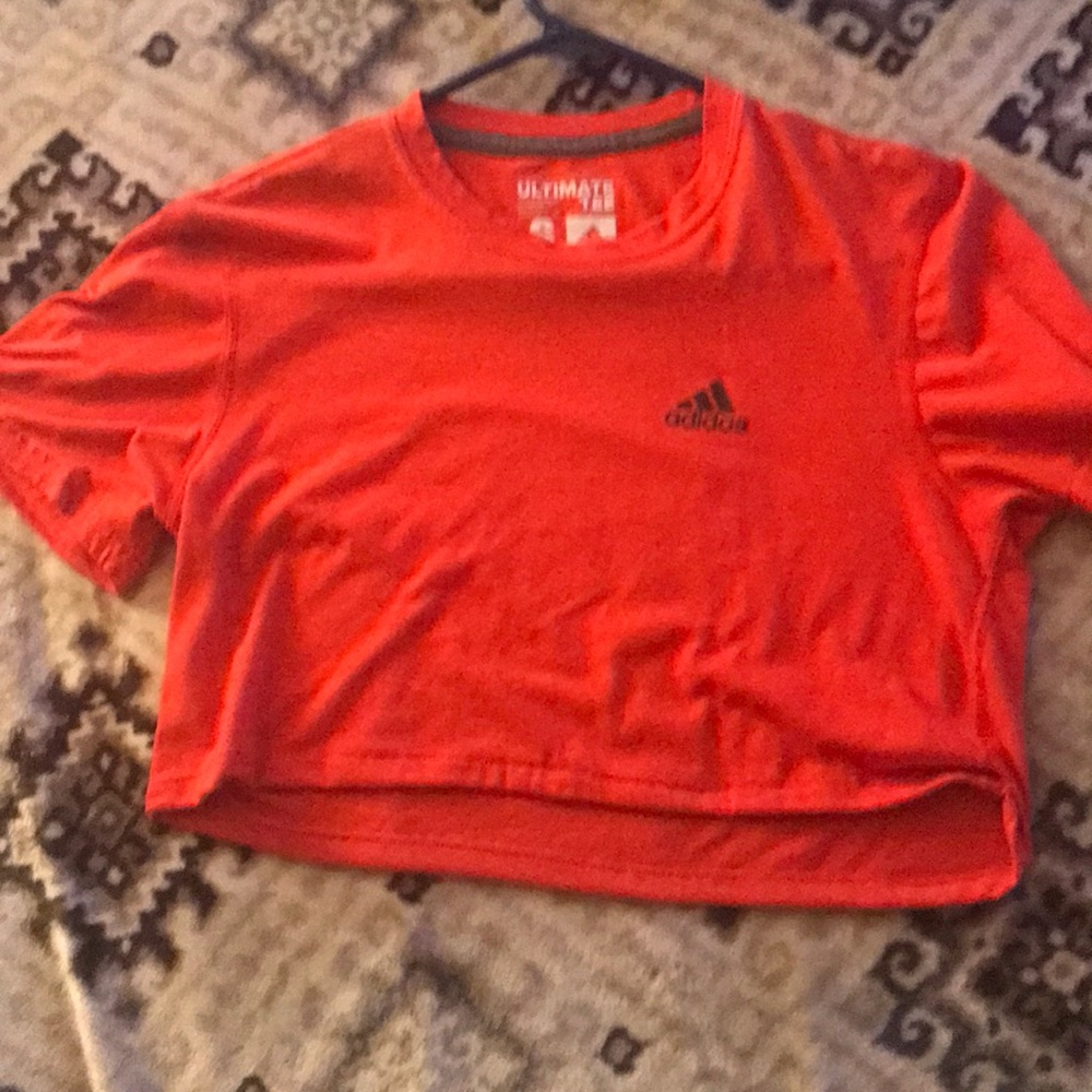 A hot orange / pink crop top from adidas